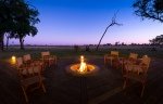 ...has a fire pit on a wooden deck